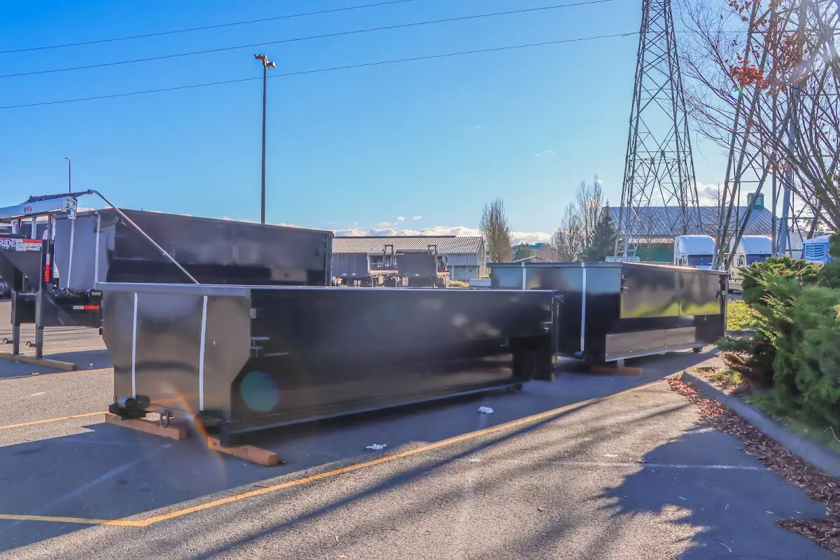 Roll-off dumpster ready for waste disposal at job site for 2 Yard Dumpster Rental in West Boylston